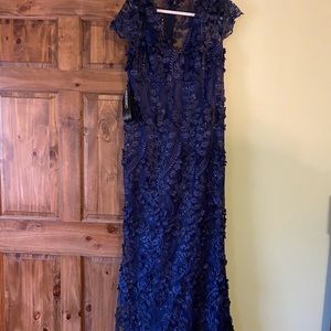 New w/tags, navy, floral mother of the bride dress. Never worn. Saks 5th Ave.